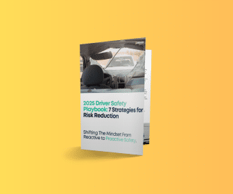 A booklet titled 2025 Driver Safety Playbook: 7 Strategies for Risk Reduction stands upright against a yellow background.
